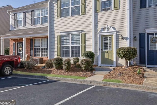 13300 Morris Rd Unit 62, Alpharetta, GA 30004 - view of front of house featuring uncovered parking