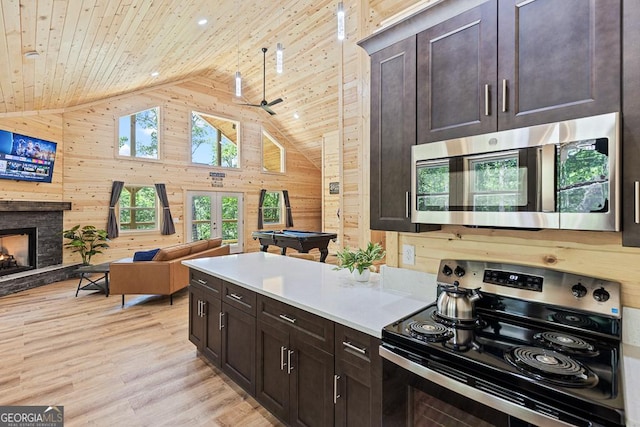 139 Maple Ridge Dr, Cleveland, GA 30528 - kitchen with stainless steel appliances, wood walls, open floor plan, wood ceiling, and pool table