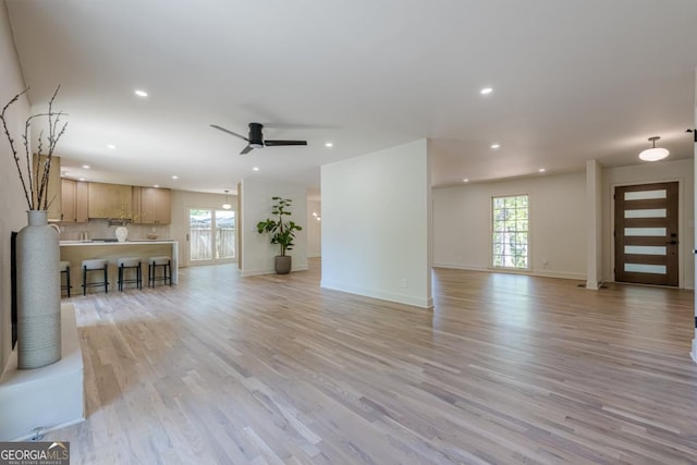3350 Pine Meadow Rd NW, Atlanta, GA 30327 - unfurnished living room with recessed lighting, light wood-style floors, and a ceiling fan