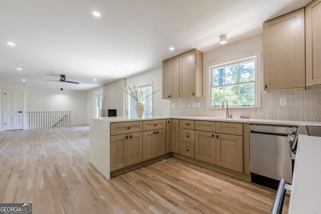 3350 Pine Meadow Rd NW, Atlanta, GA 30327 - kitchen with stainless steel appliances, a peninsula, recessed lighting, plenty of natural light, and light wood-type flooring