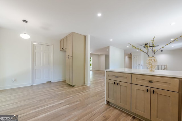 3350 Pine Meadow Rd NW, Atlanta, GA 30327 - kitchen with light wood finished floors, decorative light fixtures, light countertops, recessed lighting, and open floor plan
