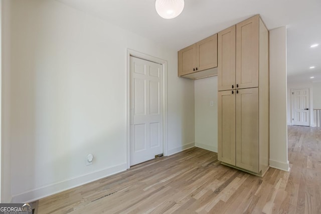 3350 Pine Meadow Rd NW, Atlanta, GA 30327 - unfurnished bedroom with light wood finished floors and baseboards