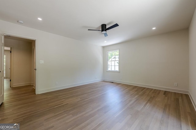 3350 Pine Meadow Rd NW, Atlanta, GA 30327 - empty room featuring a ceiling fan, wood finished floors, and recessed lighting