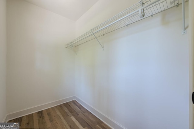3350 Pine Meadow Rd NW, Atlanta, GA 30327 - spacious closet with wood finished floors