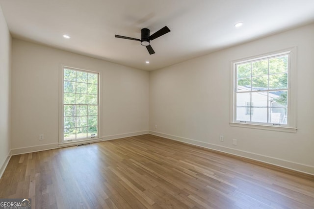 3350 Pine Meadow Rd NW, Atlanta, GA 30327 - spare room featuring wood finished floors, a ceiling fan, and recessed lighting