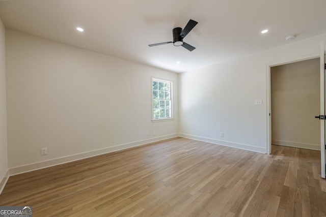 3350 Pine Meadow Rd NW, Atlanta, GA 30327 - empty room featuring a ceiling fan, light wood-style floors, recessed lighting, and a smoke detector