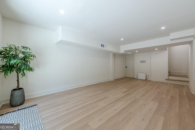 3350 Pine Meadow Rd NW, Atlanta, GA 30327 - unfurnished room with light wood finished floors, stairs, and recessed lighting