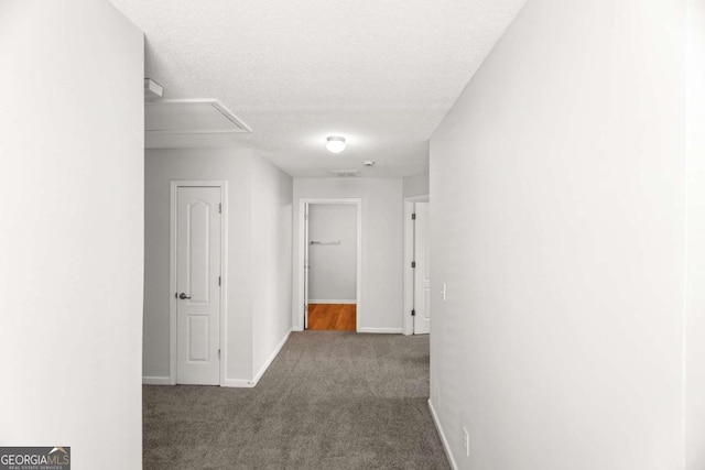 3134 Imperial Cir SW, Atlanta, GA 30311 - hallway featuring carpet floors, a textured ceiling, and attic access
