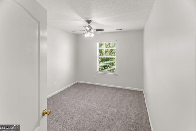 3134 Imperial Cir SW, Atlanta, GA 30311 - empty room featuring a ceiling fan, carpet flooring, and a textured ceiling