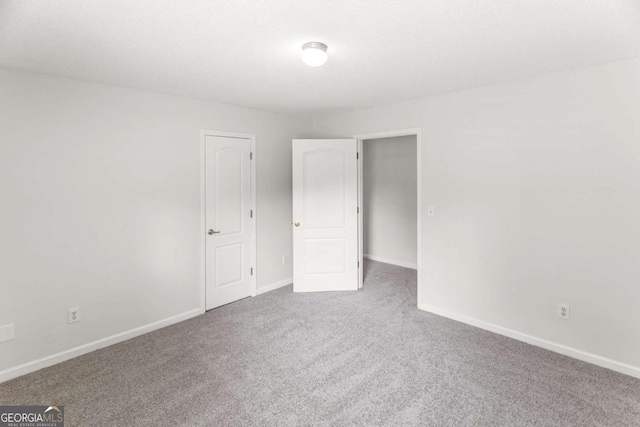 3134 Imperial Cir SW, Atlanta, GA 30311 - unfurnished bedroom featuring carpet floors and baseboards