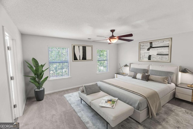 3134 Imperial Cir SW, Atlanta, GA 30311 - carpeted bedroom with a textured ceiling and a ceiling fan