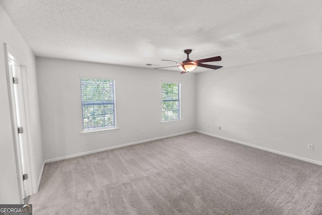 3134 Imperial Cir SW, Atlanta, GA 30311 - unfurnished room with carpet floors, ceiling fan, and a textured ceiling