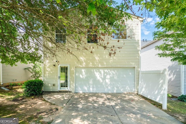 3134 Imperial Cir SW, Atlanta, GA 30311 - rear view of house with a garage and driveway
