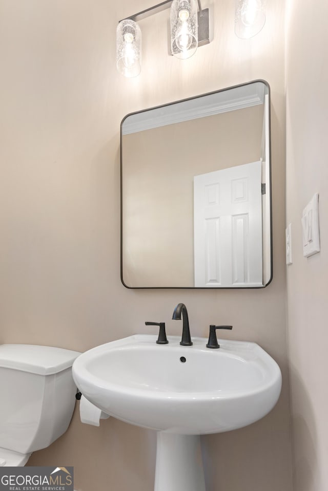 140 Longwater Cv, Roswell, GA 30075 - bathroom with toilet and a sink
