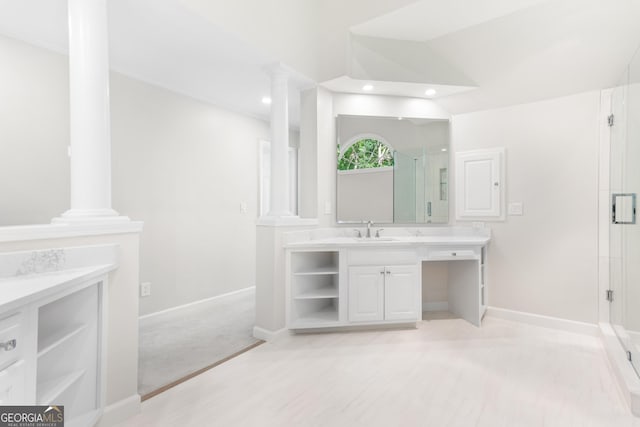 140 Longwater Cv, Roswell, GA 30075 - bathroom with ornate columns, vanity, a shower stall, recessed lighting, and vaulted ceiling