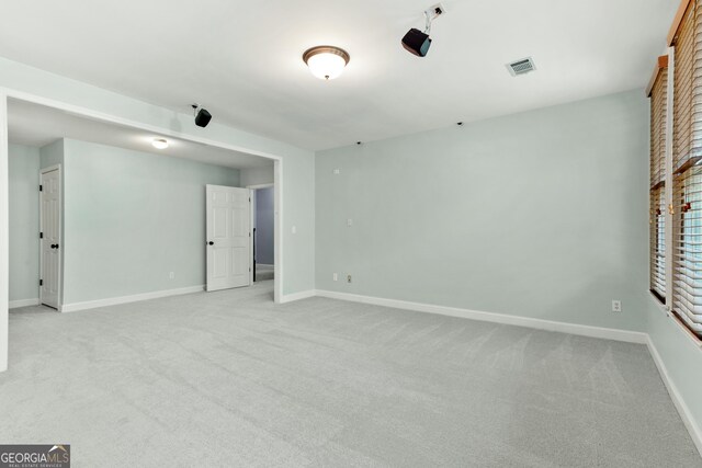 140 Longwater Cv, Roswell, GA 30075 - carpeted empty room featuring baseboards