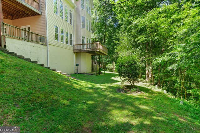 140 Longwater Cv, Roswell, GA 30075 - view of green lawn featuring a wooden deck