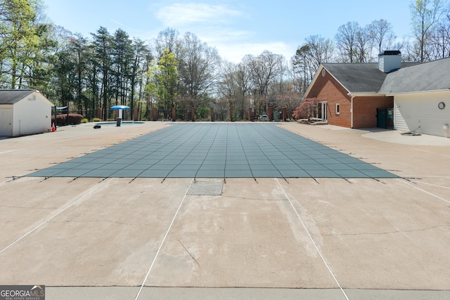 140 Longwater Cv, Roswell, GA 30075 - community pool featuring a patio area