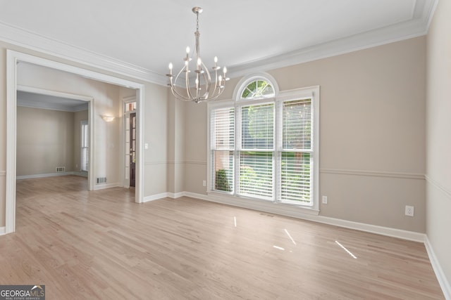 140 Longwater Cv, Roswell, GA 30075 - empty room with ornamental molding, a chandelier, light wood-type flooring, and baseboards