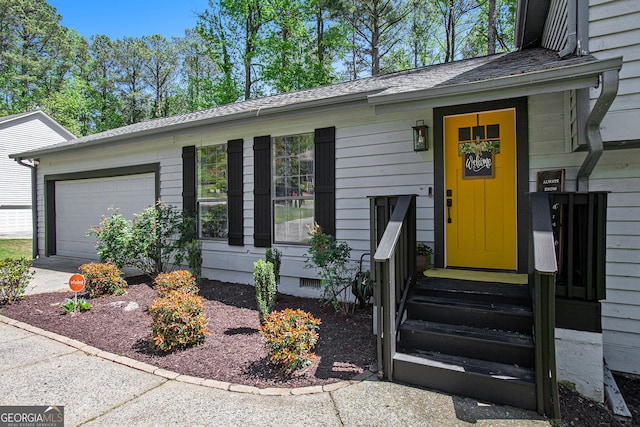 2022 Ramblewood Ct NE, Marietta, GA 30062 - entrance to property featuring crawl space, an attached garage, and driveway