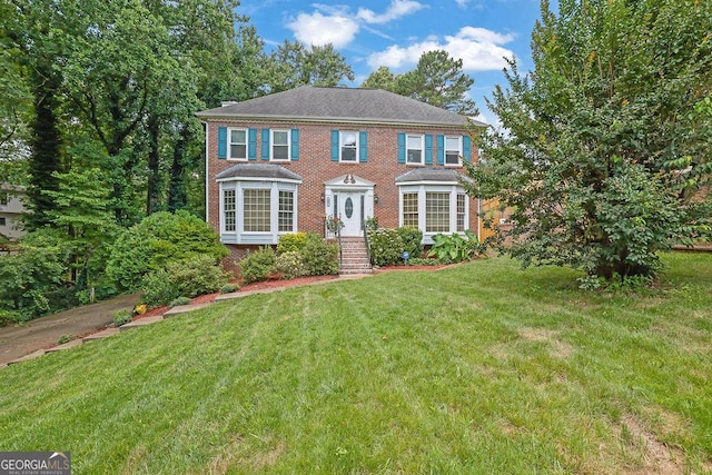 3897 Tanbark Ct, Marietta, GA 30066 - colonial inspired home with a front lawn and brick siding