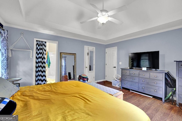 3897 Tanbark Ct, Marietta, GA 30066 - bedroom featuring a raised ceiling, dark wood-type flooring, ornamental molding, ceiling fan, and ensuite bath