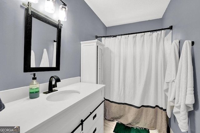 3897 Tanbark Ct, Marietta, GA 30066 - bathroom with vanity and curtained shower