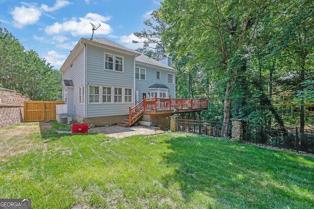 3897 Tanbark Ct, Marietta, GA 30066 - back of house with a deck, stairs, a fenced backyard, and a chimney