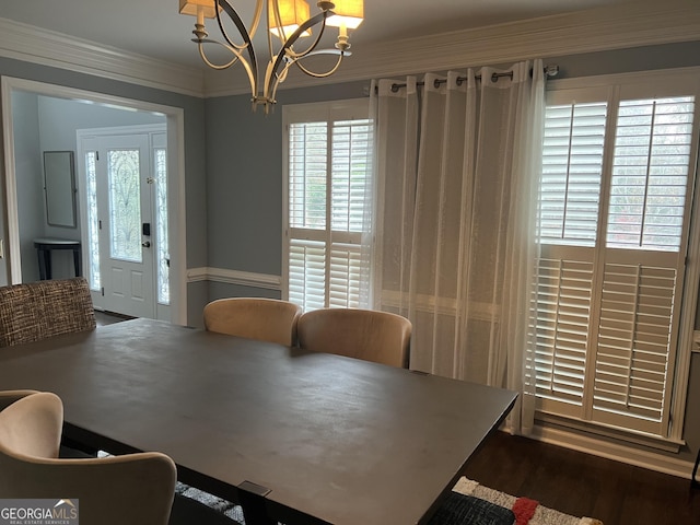 30 Highlands Ln, Oxford, GA 30054 - dining space with a chandelier, crown molding, and dark wood-style flooring