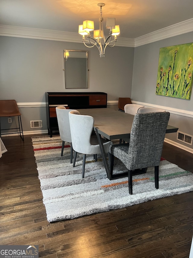 30 Highlands Ln, Oxford, GA 30054 - dining space with ornamental molding, a chandelier, dark wood-type flooring, and baseboards