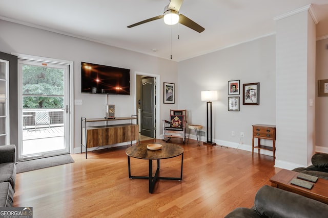 1860 Old W Broad St, Athens, GA 30606 - living area featuring ornamental molding, light wood-type flooring, a ceiling fan, and baseboards