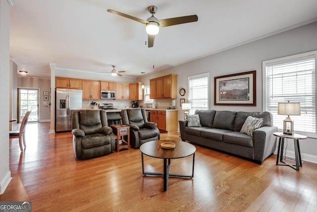 1860 Old W Broad St, Athens, GA 30606 - living room featuring ceiling fan, light wood finished floors, baseboards, and ornamental molding