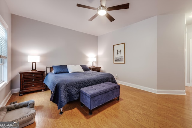 1860 Old W Broad St, Athens, GA 30606 - bedroom with light wood-style floors, baseboards, and ceiling fan