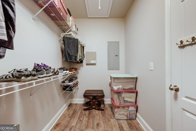 1860 Old W Broad St, Athens, GA 30606 - walk in closet with wood finished floors, electric panel, and attic access