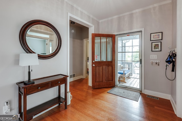 1860 Old W Broad St, Athens, GA 30606 - foyer entrance featuring light wood finished floors, baseboards, and crown molding