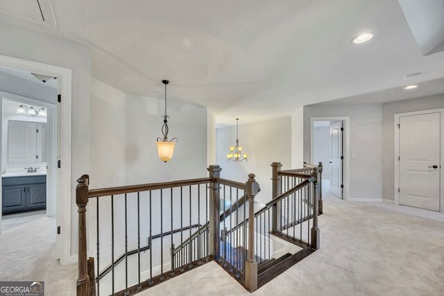 1231 Fawndale Dr NW, Kennesaw, GA 30152 - stairway with carpet floors, a chandelier, and recessed lighting