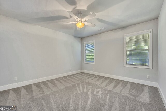 1231 Fawndale Dr NW, Kennesaw, GA 30152 - empty room with carpet and ceiling fan