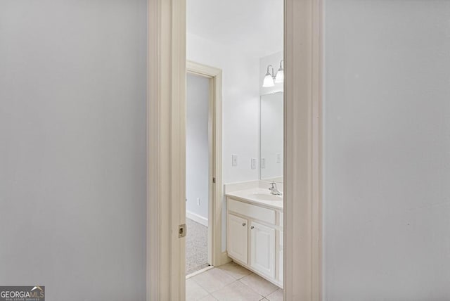 1500 Royce Dr, Locust Grove, GA 30248 - bathroom with vanity and tile patterned flooring