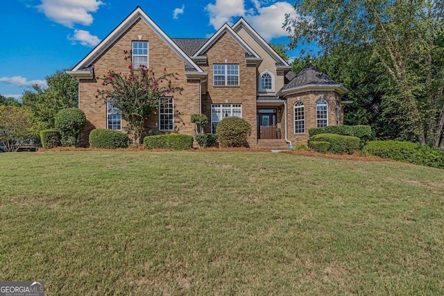 1500 Royce Dr, Locust Grove, GA 30248 - traditional home with brick siding and a front lawn
