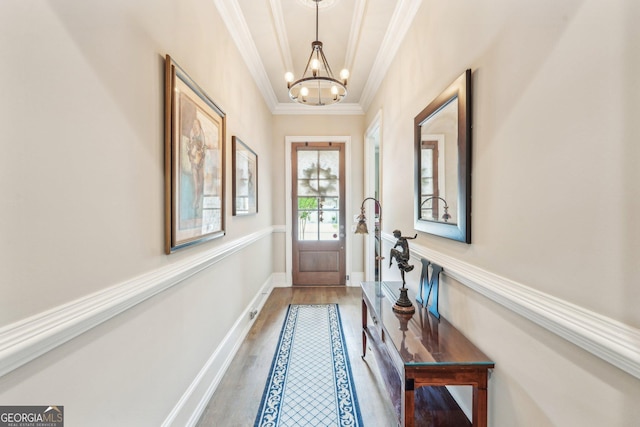 332 Rosshandler Rd, Suwanee, GA 30024 - doorway to outside with a chandelier, ornamental molding, and wood finished floors