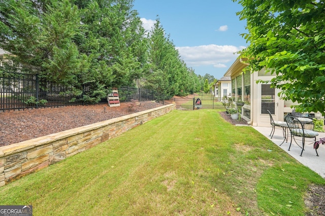 332 Rosshandler Rd, Suwanee, GA 30024 - view of yard featuring a patio