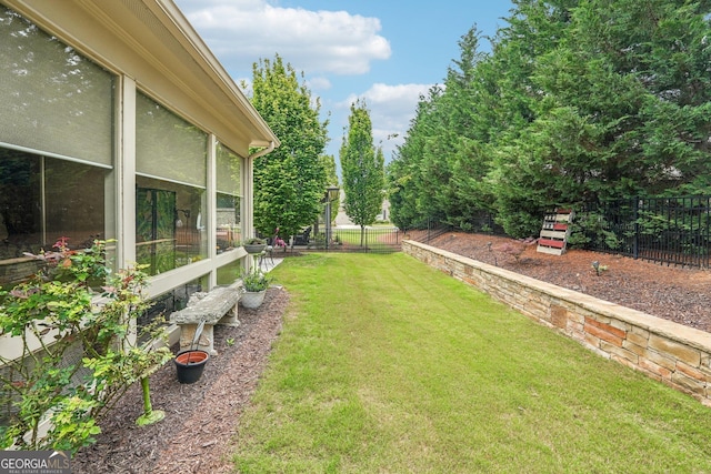 332 Rosshandler Rd, Suwanee, GA 30024 - view of yard with a sunroom