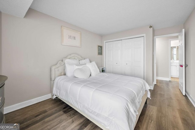 375 Ralph Mcgill Blvd NE Unit 707, Atlanta, GA 30312 - bedroom featuring wood finished floors, baseboards, and a closet