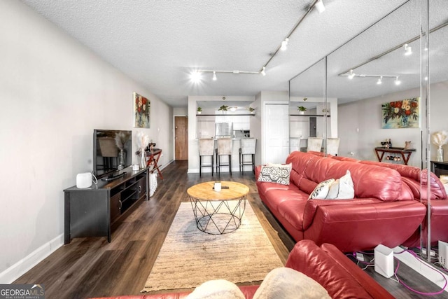 375 Ralph Mcgill Blvd NE Unit 707, Atlanta, GA 30312 - living area with baseboards, wood finished floors, rail lighting, and a textured ceiling