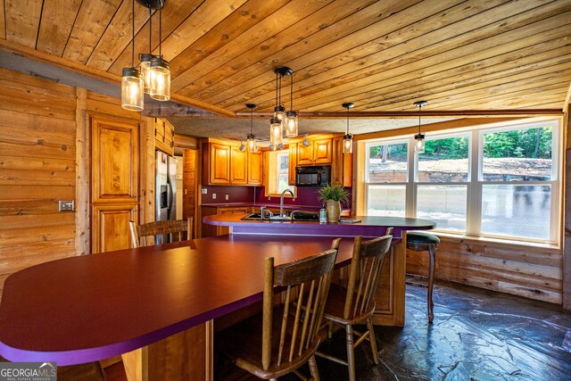 230 Kelly Dr, Hamilton, GA 31811 - kitchen featuring black microwave, wood ceiling, stainless steel fridge with ice dispenser, a sink, and wood walls