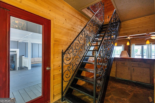 230 Kelly Dr, Hamilton, GA 31811 - stairs with wooden walls