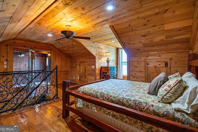 230 Kelly Dr, Hamilton, GA 31811 - bedroom with wooden ceiling, wood-type flooring, wood walls, lofted ceiling, and recessed lighting