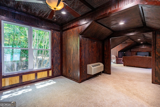 230 Kelly Dr, Hamilton, GA 31811 - additional living space with wood walls, carpet flooring, a ceiling fan, a wall unit AC, and lofted ceiling