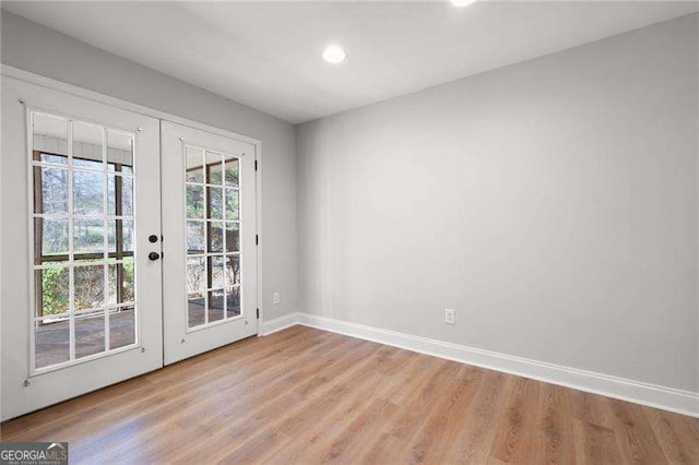 85 Stiles Dr, Dallas, GA 30132 - entryway with french doors, light wood finished floors, and recessed lighting