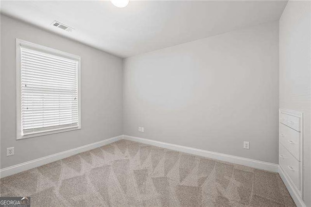85 Stiles Dr, Dallas, GA 30132 - unfurnished room with light colored carpet and baseboards